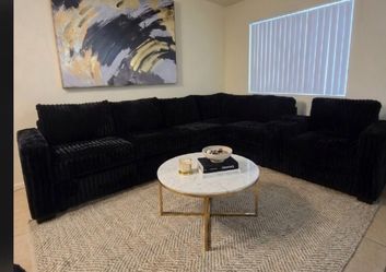 Large sectional sofa black fur- like jumbo corduroy