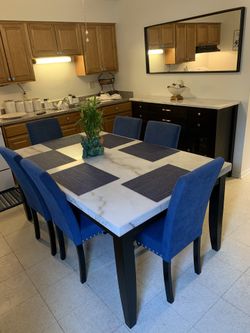 kitchen table  Long 70’’  height 31’’   6 Chairs