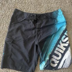 Quiksilver Vintage Men's Black and Teal Board Shorts - Size M - Good Condition