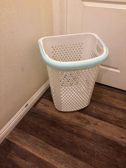 Plastic rolling laundry basket