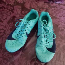 Nike racing shoes size 9.5 well taken care of