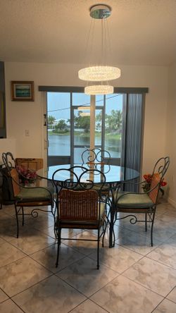 Beautiful Glass Dining Table with 4 Chairs – Price Negotiable
