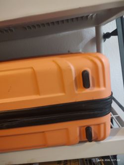 Extra large Startravel orange hard-shell suitcase (If you see it it's available)