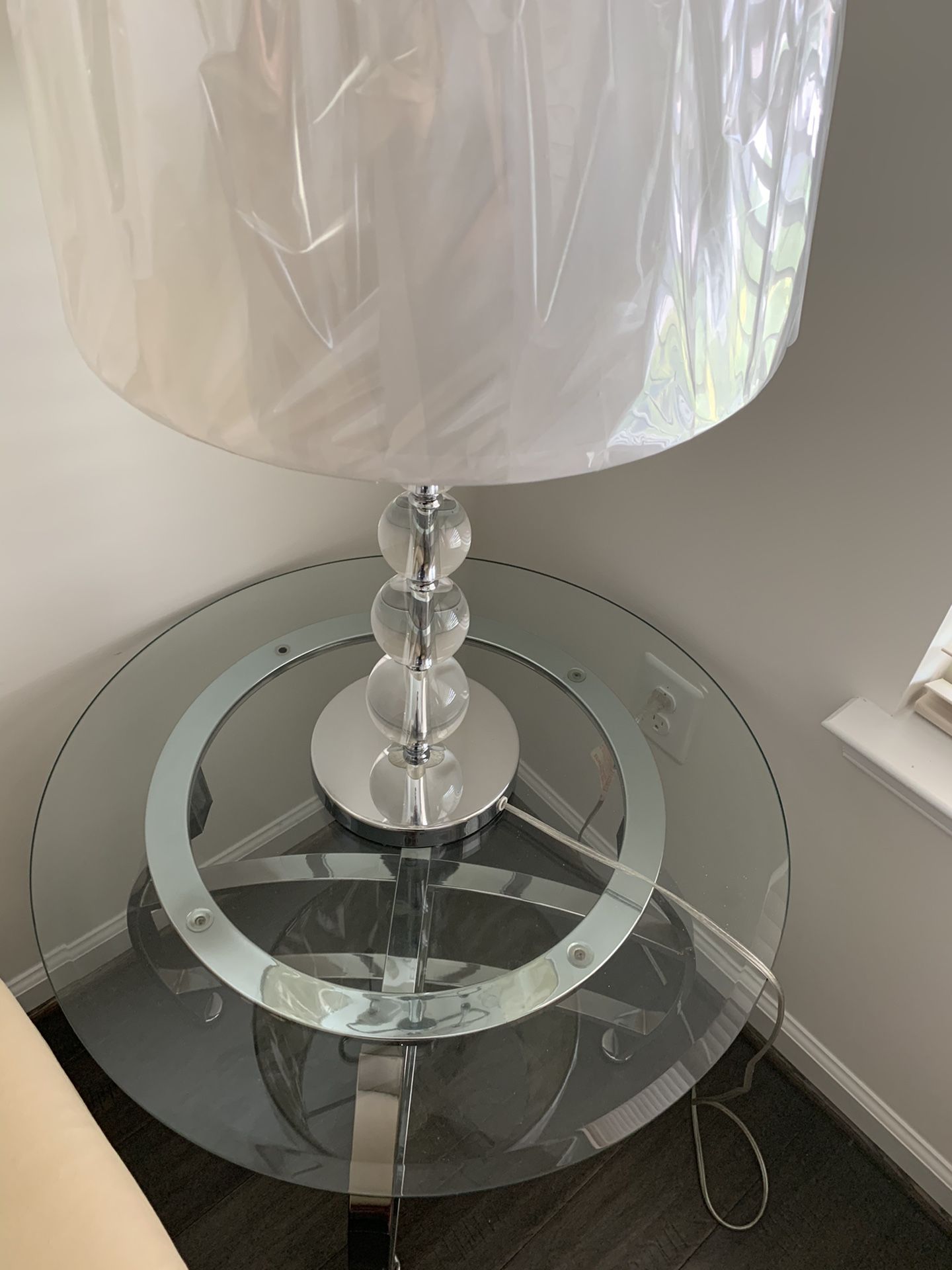 Glass Side Tables with lamps and coffee table