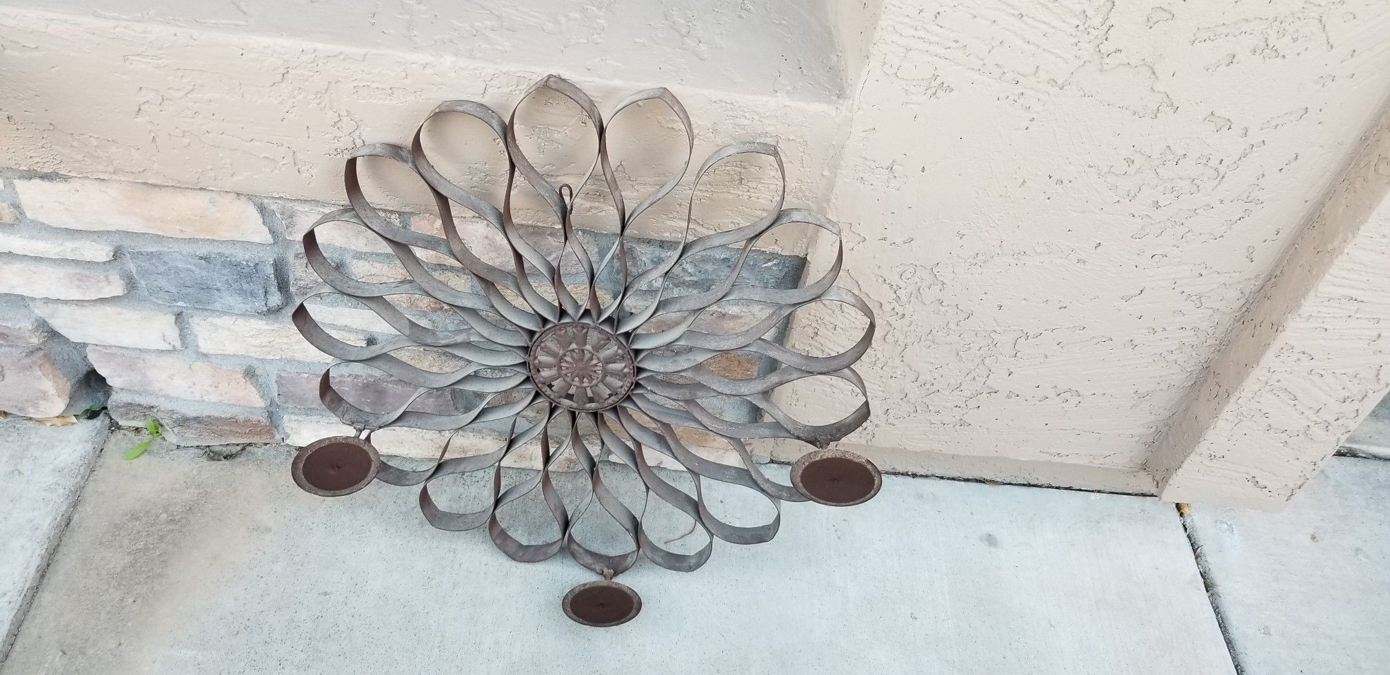 Wrought iron candle holder flower pattern