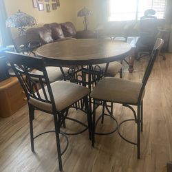 Hammered metal table with (4) Chairs