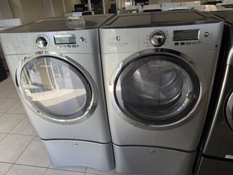USED ELECTROLUX WASHER & DRYER SET WITH PEDESTAL