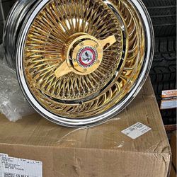 Wire Wheels 13x7 100 Spokes  Gold Center with White wall tires on Chevy Impal New wheels tires