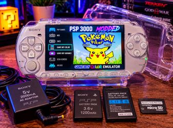 PSP 3000 w/ 1,000+ Games + NES, SNES, Sega, & Game Boy Color – Clear Shell – 2 Batteries