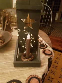 primitive candle holder with candle