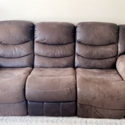 Two Piece Leather Couch Set With Recliners. 