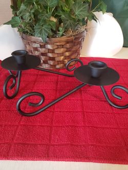 Two candle stick holders