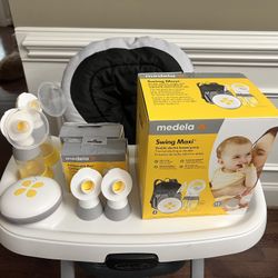 2 Medela Swing Maxi Breast Pumps 