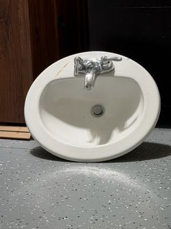 Oval drop in bathroom Sink with faucet