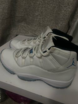 Size 7 men’s Jordan 11s legend blues
