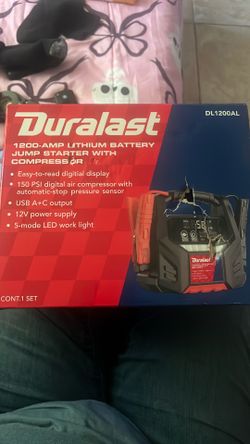 Portable battery jumper with compressor