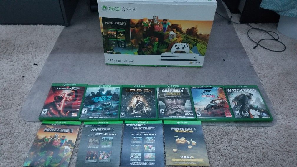 X box one s with a lot games