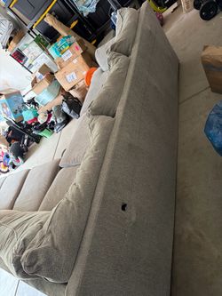 Free Sectional. Comfortable and clean just has a bulge in the back that would be covered by wall