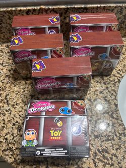 Many pack of Disney doorables unopened