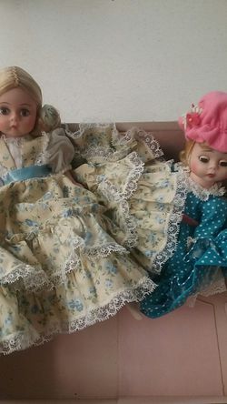 To Madame Alexander dolls one with shoes very nice