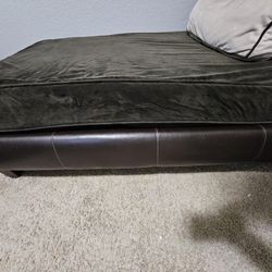 Brown leather sofa(chaise) with cushions. 