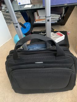 “Ricardo Elite” NEW Travel Or Business Case On Rollers With (3) Compartments For Clothes, Sundries And Laptop. Others Ask $50-$60 USED. Sell For 1/2