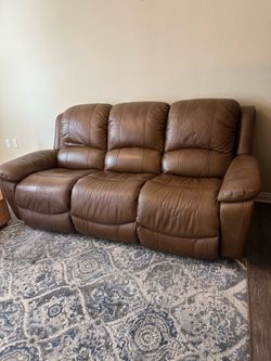 Leather sofa with 2 power recliners