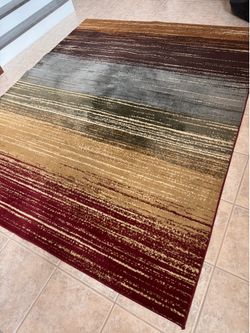 8 x 10 Area Rug  Colors of Brown, Gold, Mustard