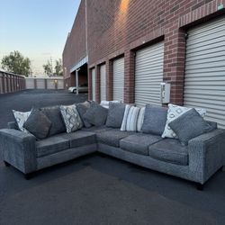 Really nice great IKEA sectional couch with decorative pillows