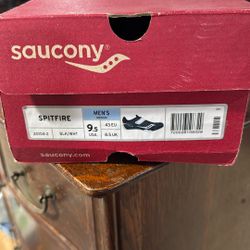 Saucony Men's Spitfire track spikes in black and white, size 9.5 US. 