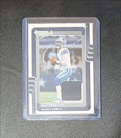 Dak Prescott card with a piece of his jersey he's worn in a hard protective case.  $15