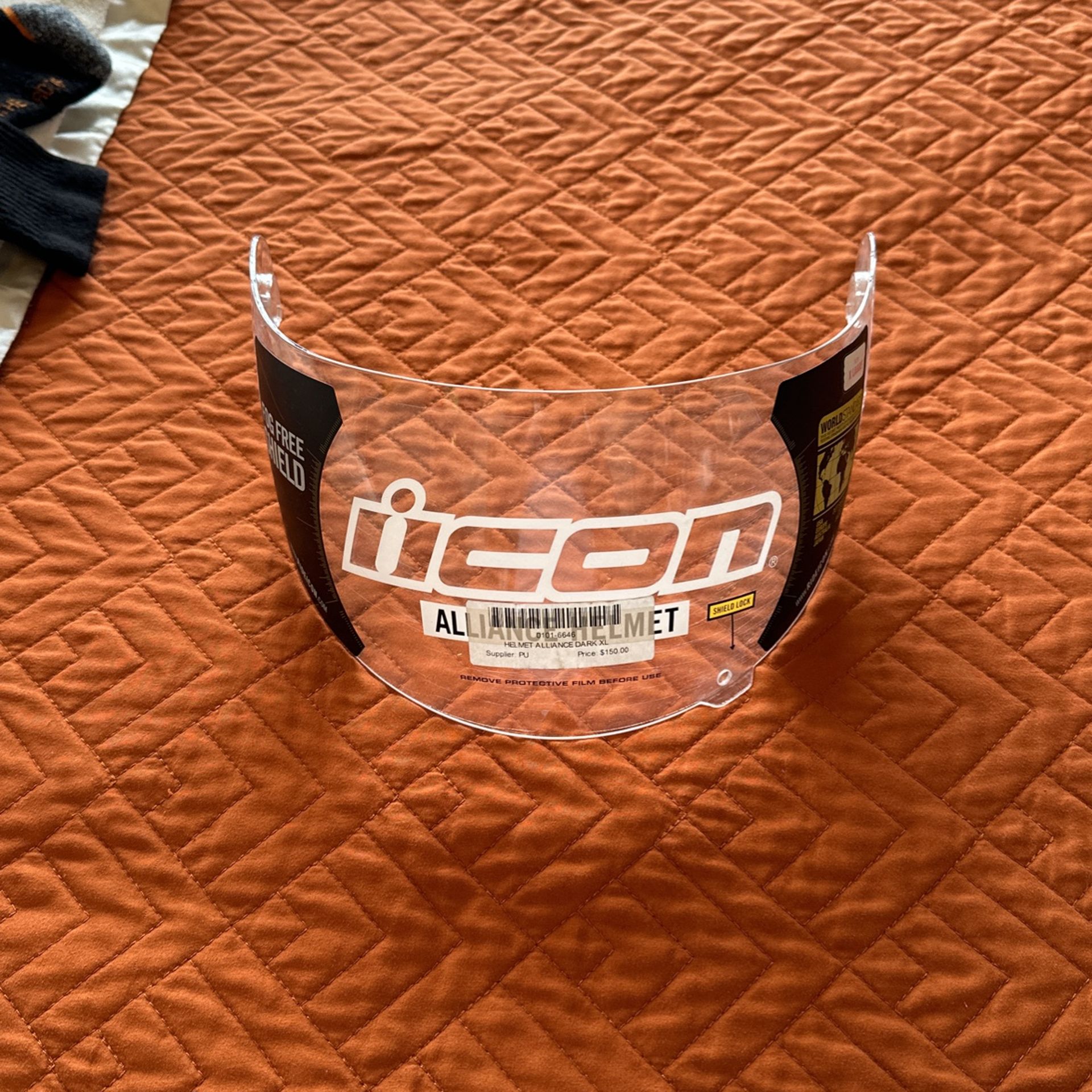 Motorcycle helmet shield