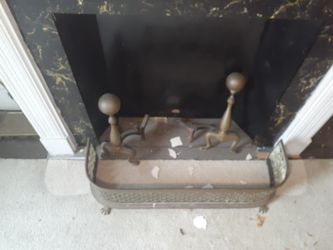 Old copper fire place cover and wood holder