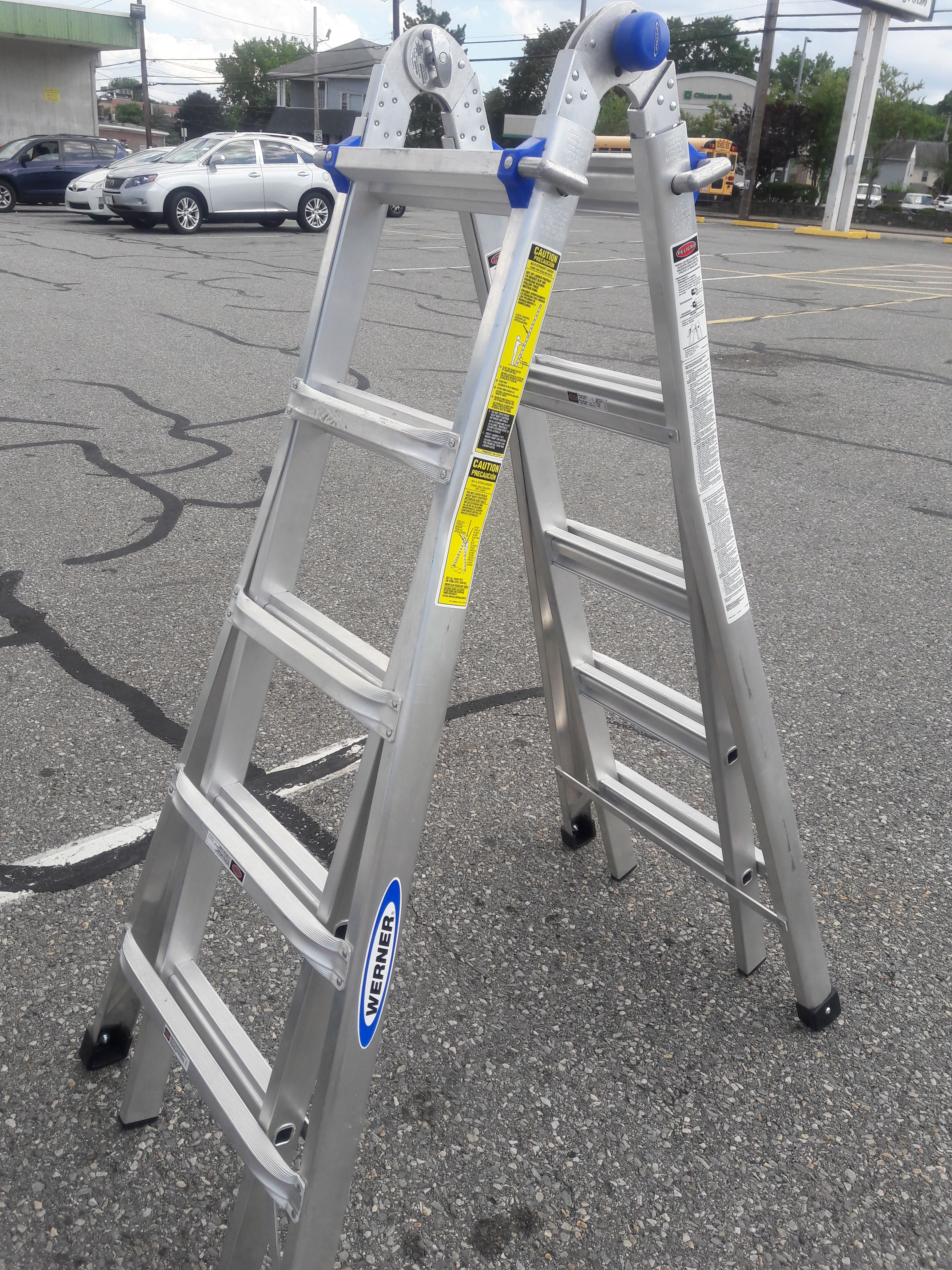 Werner MT Aluminum 22-ft Reach Type 1A - 300 lbs. Capacity Telescoping Multi-Position Ladder