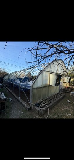 green house frame with fans