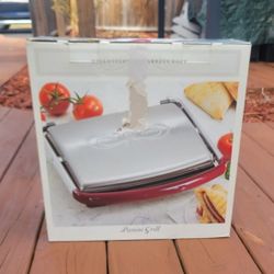 Bella Cucina Panini Grill.  Color Red and Silver