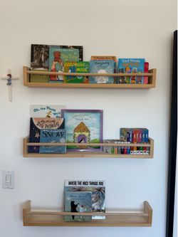 Set of three shelves for books