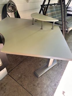 Adjustable height desk