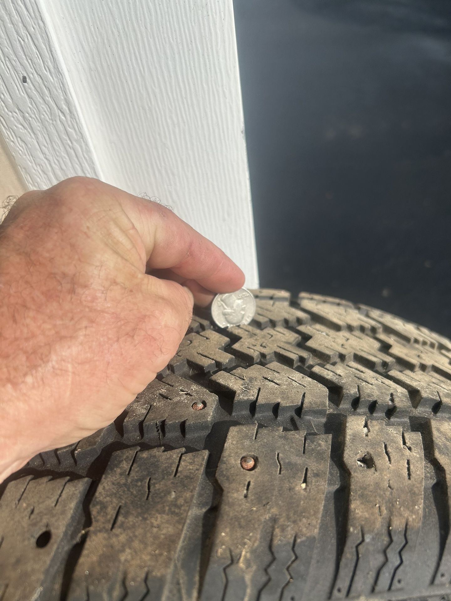 4).  225/55R17.    97T.      Studded Tires.   