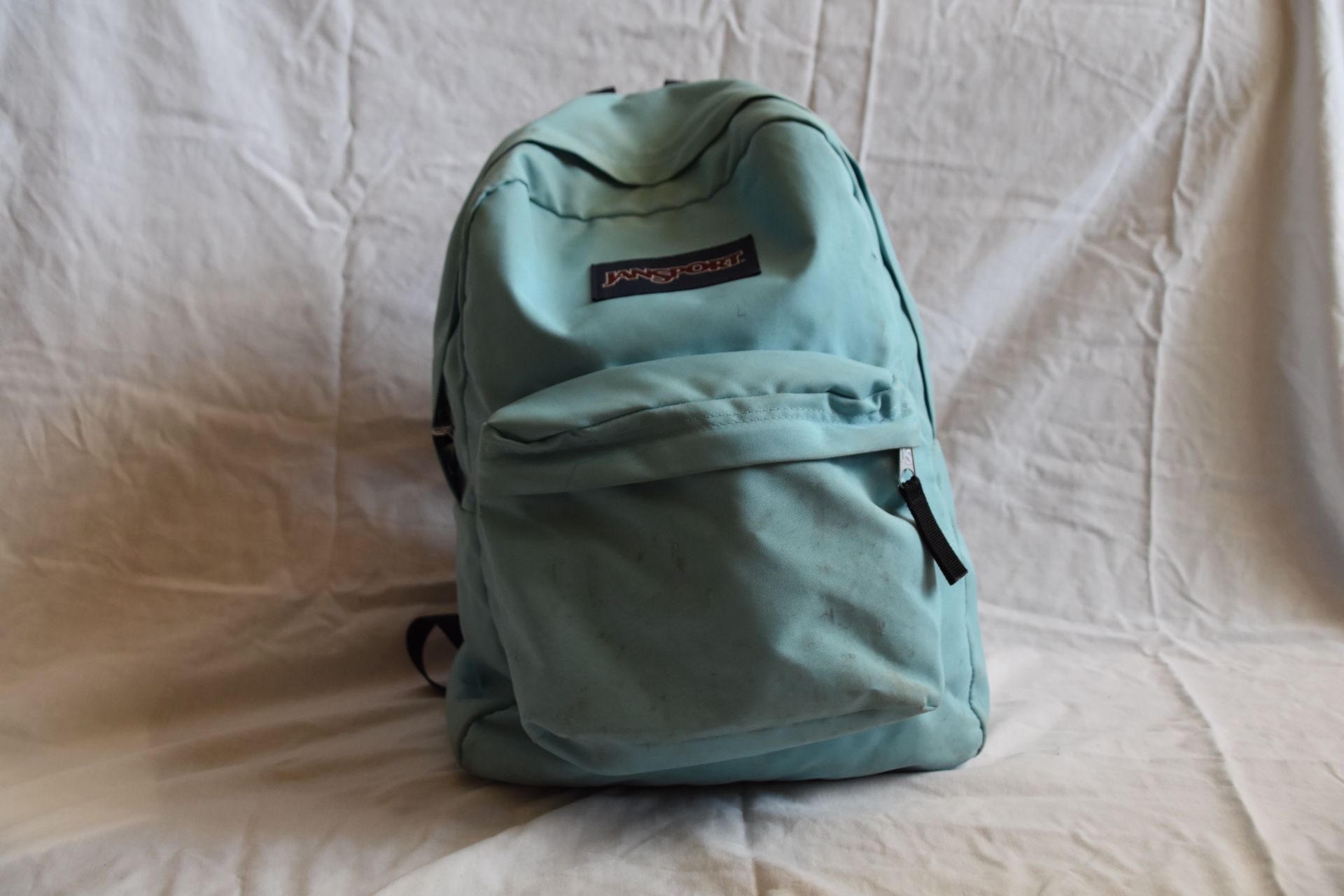 Aqua blue Jansport backpack (superbreak)