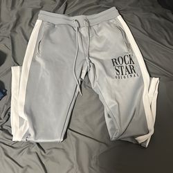 A size XL rock star original grey sweatpants