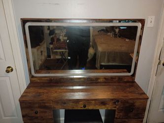 A women's makeup dresser