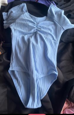 Camisa tipo body