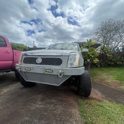 Cadillac ext lifted truck