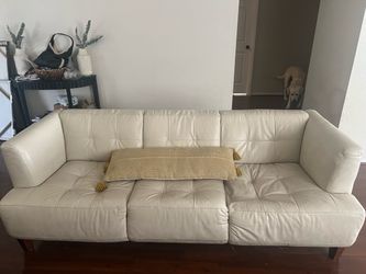 Cream leather sofa and loveseat set