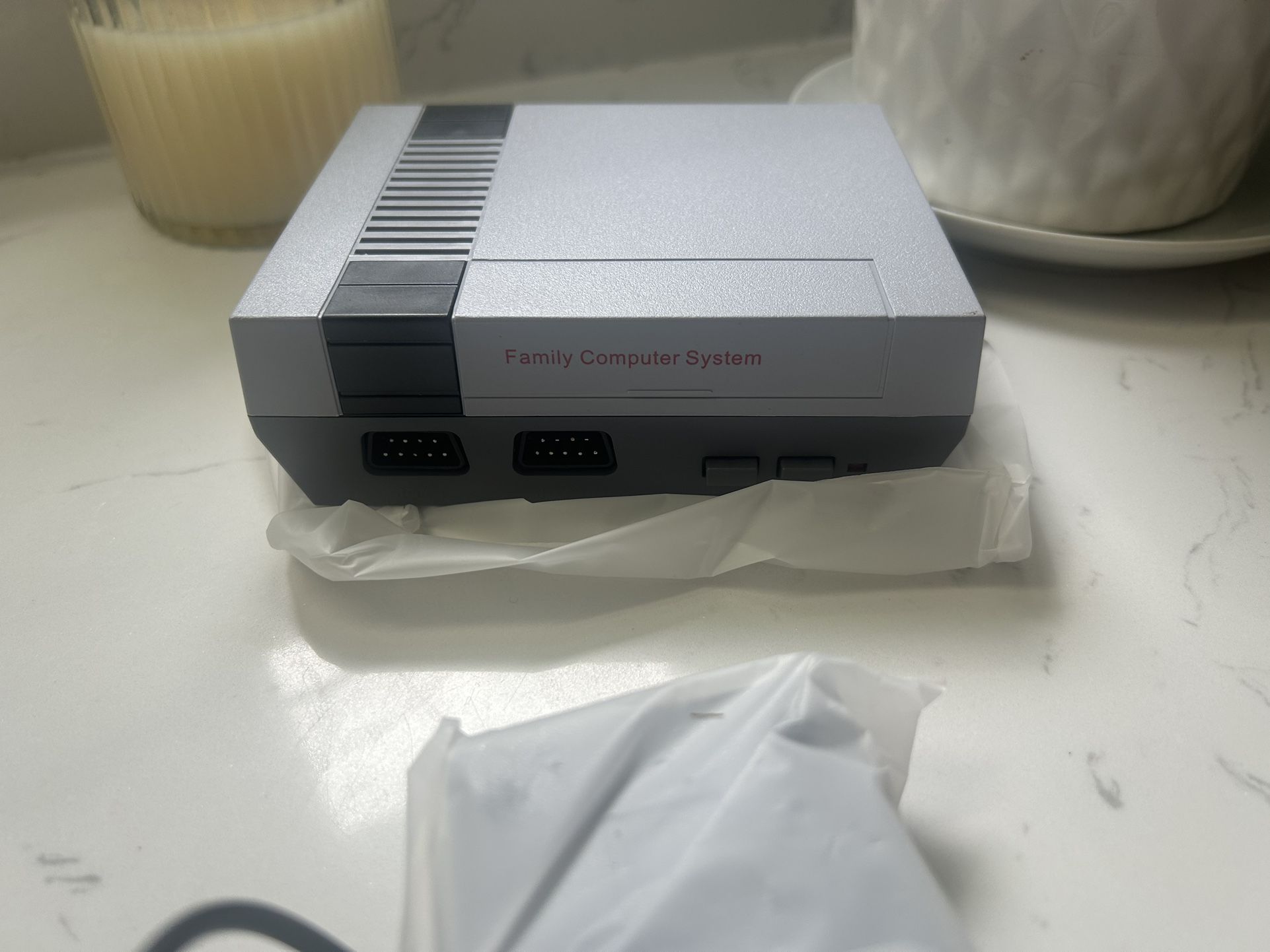 Mini Game Anniversary Edition Entertainment System model is a plug-n'-play Famiclone based on the NE