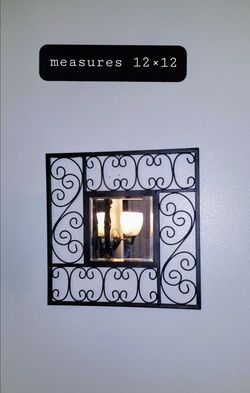 Black metal mirror