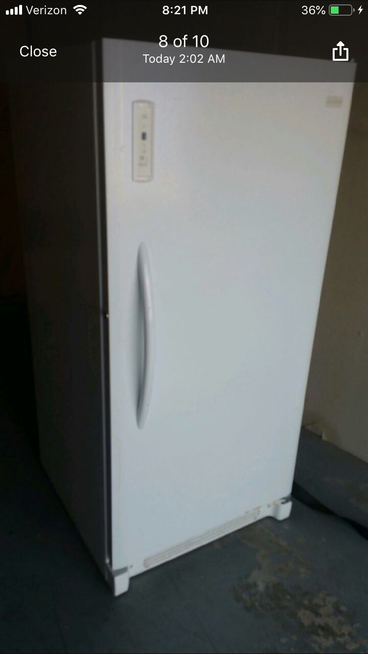 Frigidaire freezer 60 inches high, 28 inches across and 28 1/2 inches deep lightly used $150