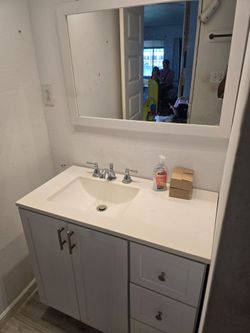 Sink with mirror