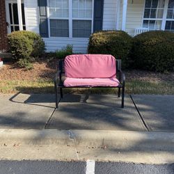 Black Steel Bench with 2 Red cushions